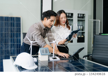 Cutting edge solar panel battery concept with our team of renewable energy engineers Cutting edge solar panel battery concept with our team of renewable energy engineers 134249616