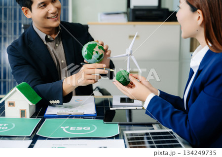Business team people planning hand using laptop for working technology and business Net zero and carbon neutral concept. Business team people planning hand using laptop for working technology and business Net zero and carbon neutral concept. 134249735