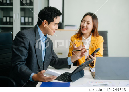 Portrait of success business people working together in modern office. Business teamwork startup Portrait of success business people working together in modern office. Business teamwork startup 134249748