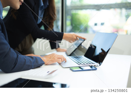 Business team meeting present.professional investor working with Finance managers task. with digital tablet,smartphone Business team meeting present.professional investor working with Finance managers task. with digital tablet,smartphone 134250801