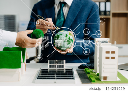 Business team people planning hand using laptop for working technology and business Net zero and carbon neutral concept. Business team people planning hand using laptop for working technology and business Net zero and carbon neutral concept. 134251929