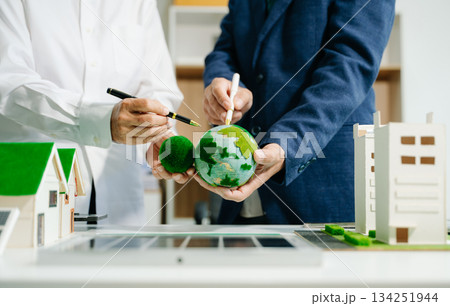 business team people planning and discussing on recycle reduce reuse policy symbol in office meeting room. business team people planning and discussing on recycle reduce reuse policy symbol in office meeting room. 134251944