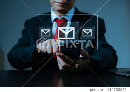 Man hands using Laptop, tablet typing on keyboard and surfing the internet with email icon, email marketing concept, send e-mail 134252052