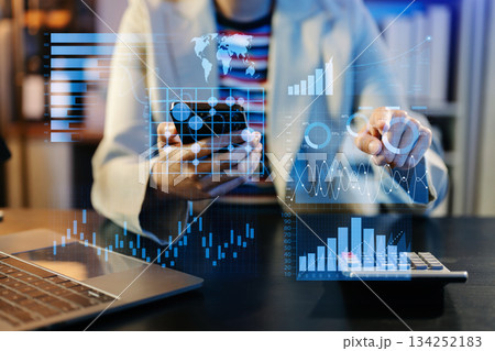 Intelligence and business analytics with key performance indicators dashboard concept. Two business colleague web designer discussing data Intelligence and business analytics with key performance indicators dashboard concept. Two business colleague web designer discussing data 134252183