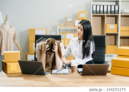 Asian team owner woman prepare parcel box  woman is stressed, bored, and overthinking from working 134253173