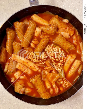 Rabokki, Korean style Stir-fried Instant Noodle : This dish is tteokbokki with ramen noodles. Tteokbokki is a spicy dish made with rice cake, vegetables, and fish cake, all stir-fried together in a go 134253839
