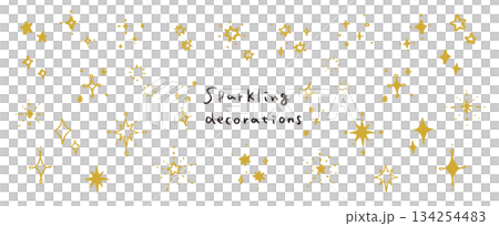 A set of hand-drawn glitter and sparkle elements. Star and sparkle decorations. 134254483