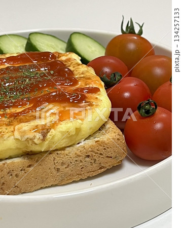 Fresh Chicken Caesar Salad with crisp romaine lettuce, juicy grilled chicken, crunchy croutons, and creamy Caesar dressing. A classic, flavorful, and satisfying dish perfect for any meal! 134257133