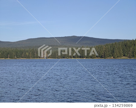 vast mountain water body surrounded by verdant hills offers tranquil hiking opportunities and scenic vast mountain water body surrounded by verdant hills offers tranquil hiking opportunities and scenic 134259869