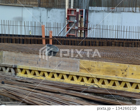 neatly organized panels and timber supports ready for efficient construction progress and logistics neatly organized panels and timber supports ready for efficient construction progress and logistics 134260210