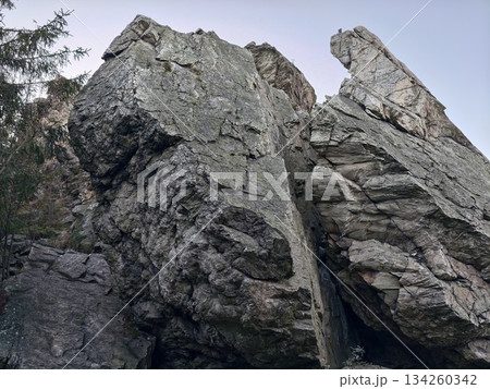 stunning natural cliffs, spectacular craggy rock structures dramatically rise to touch endless sky 134260342