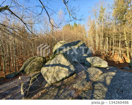 vast natural landscape viewing point, panoramic hilltop scene with glowing sunlight and distant horizon 134260486