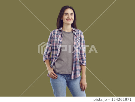 Portrait of smiling young woman in casual clothes 134261971