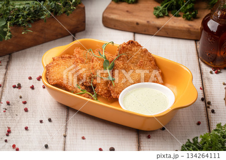 Crispy chicken cutlets with dipping sauce Crispy chicken cutlets with dipping sauce 134264111