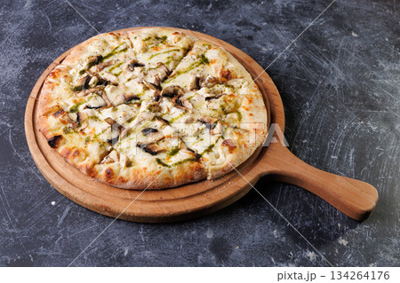 Gourmet Mushroom Cheese Pizza On Circular Wooden Board Gourmet Mushroom Cheese Pizza On Circular Wooden Board 134264176