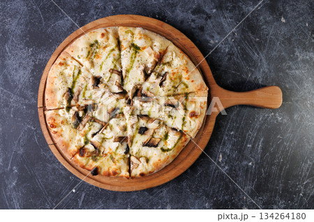 Gourmet Mushroom Cheese Pizza On Circular Wooden Board Gourmet Mushroom Cheese Pizza On Circular Wooden Board 134264180