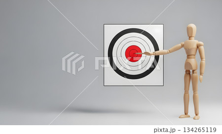 ターゲットの中心を指差し目標を定めるデッサン人形 134265119