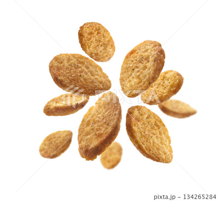 Bread croutons levitate on a white background Bread croutons levitate on a white background 134265284