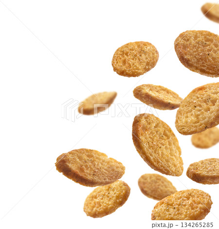 Bread croutons levitate on a white background Bread croutons levitate on a white background 134265285