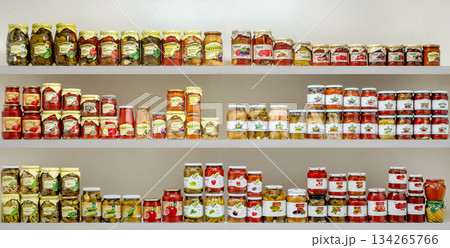 Yerevan Armenia 12.5.2025. A shelf full of jars of various colors and sizes Yerevan Armenia 12.5.2025. A shelf full of jars of various colors and sizes 134265766