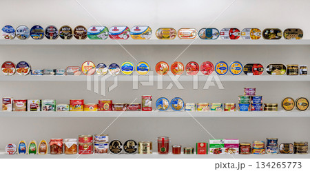 Yerevan Armenia 12.5.2025. A shelf full of canned goods, including some that say "tuna." Yerevan Armenia 12.5.2025. A shelf full of canned goods, including some that say "tuna." 134265773