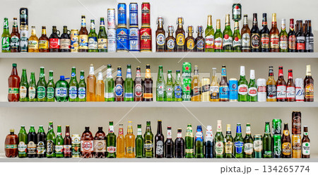 Yerevan Armenia 12.5.2025. A shelf full of beer bottles with a variety of brands and colors Yerevan Armenia 12.5.2025. A shelf full of beer bottles with a variety of brands and colors 134265774
