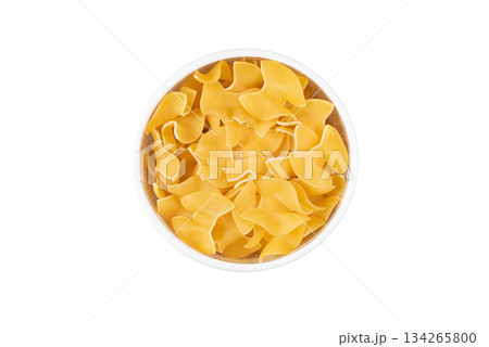 A bowl of yellow pasta 134265800