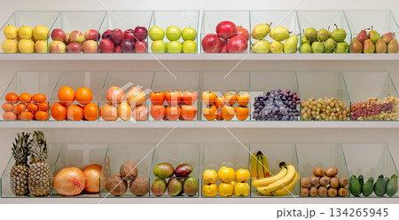 A fruit display with a variety of fruits including apples, oranges, bananas A fruit display with a variety of fruits including apples, oranges, bananas 134265945