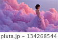 幻想的な紫色の雲の中に佇むロングドレスを着たショートヘアの女性 134268544