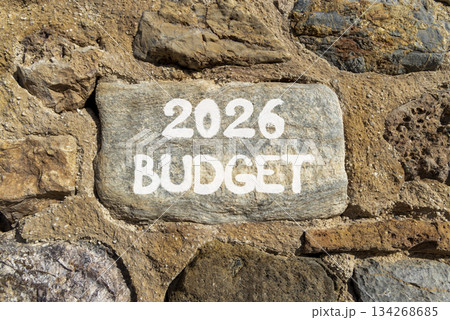 2026 Budget symbol. Concept words 2026 Budget on beautiful grey stone on stone wall. Beautiful stone wall background. Business and 2026 budget concept. Copy space. 2026 Budget symbol. Concept words 2026 Budget on beautiful grey stone on stone wall. Beautiful stone wall background. Business and 2026 budget concept. Copy space. 134268685