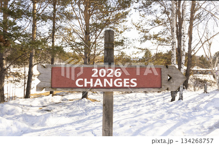 2026 Changes symbol. Concept words 2026 Changes on beautiful wooden road sign. Beautiful winter forest background. Business and 2026 changes concept. Copy space. 2026 Changes symbol. Concept words 2026 Changes on beautiful wooden road sign. Beautiful winter forest background. Business and 2026 changes concept. Copy space. 134268757