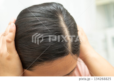 Woman with beautiful shine hair care treatment. Woman with beautiful shine hair care treatment. 134268825