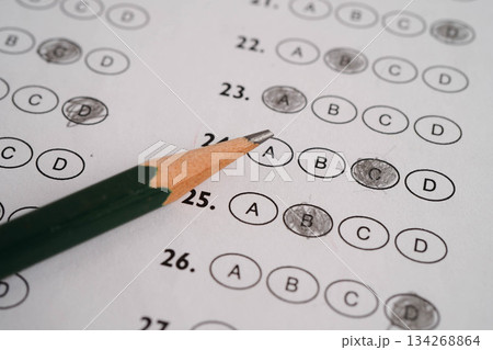 Answer sheets with pencil drawing fill to select choice, education concept. Answer sheets with pencil drawing fill to select choice, education concept. 134268864