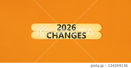 2026 Changes symbol. Concept words 2026 Changes on beautiful wooden sticks. Beautiful orange paper background. Business and 2026 changes concept. Copy space. 134269136