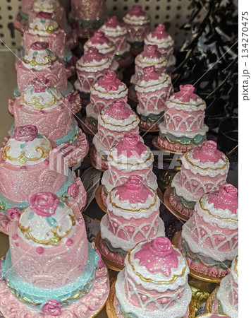 Pastel Pink Cake Figurines on Shelf Pastel Pink Cake Figurines on Shelf 134270475