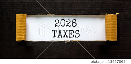2026 taxes new year symbol. Concept words 2026 taxes on beautiful white paper. Beautiful black paper background. Business and 2026 taxes new year concept. Copy space. 2026 taxes new year symbol. Concept words 2026 taxes on beautiful white paper. Beautiful black paper background. Business and 2026 taxes new year concept. Copy space. 134270634