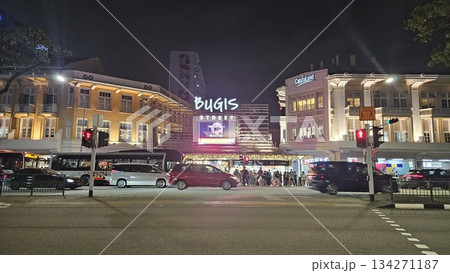 This is Bugis Street glows at night with neon signage, colonial facades, bustling traffic This is Bugis Street glows at night with neon signage, colonial facades, bustling traffic 134271187