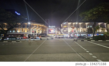 This is Bugis Street glows at night with neon signage, colonial facades, bustling traffic This is Bugis Street glows at night with neon signage, colonial facades, bustling traffic 134271188
