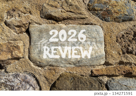 2026 Review symbol. Concept words 2026 Review on beautiful grey stone on stone wall. Beautiful stone wall background. Business and 2026 review concept. Copy space. 134271591