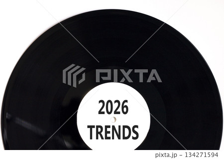 2026 Trends new year symbol. Concept words 2026 Trends on beautiful white and black vinyl disk. Beautiful white paper background. Business and 2026 Trends new year concept. Copy space. 2026 Trends new year symbol. Concept words 2026 Trends on beautiful white and black vinyl disk. Beautiful white paper background. Business and 2026 Trends new year concept. Copy space. 134271594