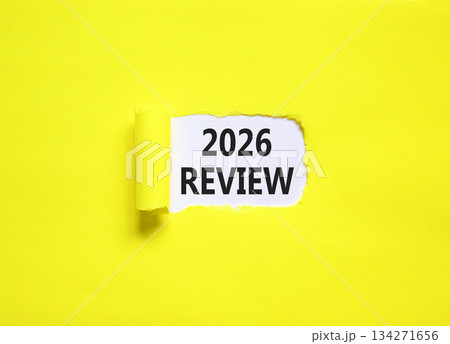 2026 Review symbol. Concept words 2026 Review on beautiful white paper. Beautiful yellow paper background. Business and 2026 review concept. Copy space. 2026 Review symbol. Concept words 2026 Review on beautiful white paper. Beautiful yellow paper background. Business and 2026 review concept. Copy space. 134271656