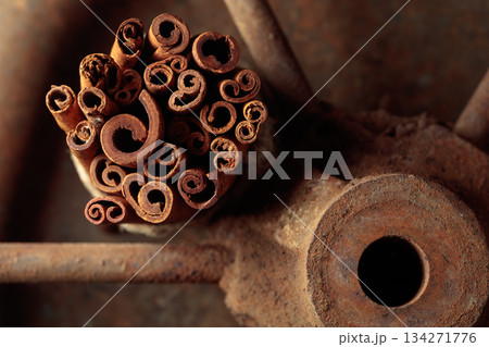 Cinnamon sticks on a rusty backgroind. 134271776