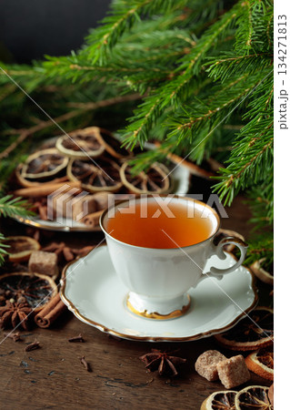Christmas tea with spices and dried citrus slices. Christmas tea with spices and dried citrus slices. 134271813