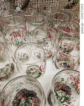 Christmas Glass Mugs with Glitter Holiday Text Display 134271932