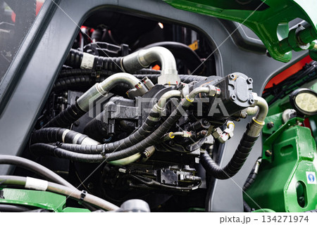 Spiral cable connecting truck cabin and trailer. Pneumatic hoses and electric cables Spiral cable connecting truck cabin and trailer. Pneumatic hoses and electric cables 134271974