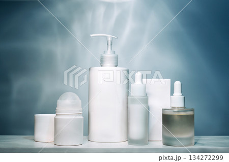 White cosmetic bottles and droppers for skincare routine 134272299