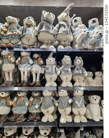 Row of Cute Plush Toys on Store Shelf 134272580