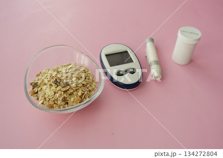 Healthy meal prep with oats and glucose meter setup Healthy meal prep with oats and glucose meter setup 134272804
