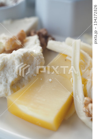 Cheese platter with various types of cheese and nuts Cheese platter with various types of cheese and nuts 134272826