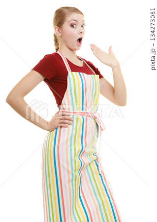 Funny housewife in kitchen apron Funny housewife in kitchen apron 134273081